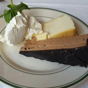 Wolfgang's Steakhouse - Cheesecake and chocolate mousse. - Steakhouses Near Me - Honolulu, Hawaii Wolfgang's Steakhouse - Cheesecake and chocolate mousse. - Steakhouses Near Me - Honolulu, Hawaii