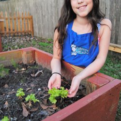 Culinary Kids - Kids get to practice gardening skills in our huge yards!