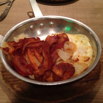 Lou Mitchell's - "Two eggs" and bacon meal... actually came with FOUR eggs, hash browns, and homemade toast for $9. Perfectly crispy bacon! - Breakfast & Brunch Near Me - Chicago, Illinois
