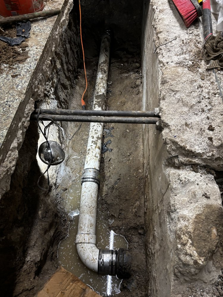 Slide of Drains Great Metropolitan Drain Cleaning