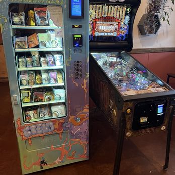 Coyote Kitchen - 8/5/2025-dining area with some entertainment and local products in a vending machine - Bars Near Me - Boone, North Carolina