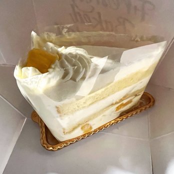 Tous Les Jours - Mango Cake. 3/5. Too much cream. IG: @amei.eats - Coffee & Tea Near Me - Chicago, Illinois