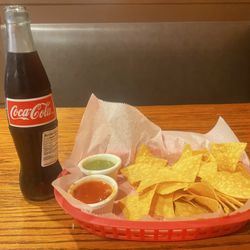 El Tipico - Mexican Coca-Cola and chips with salsa rojo and salsa verde.