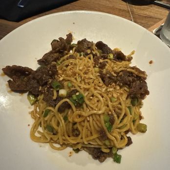 Yard House - SZECHUAN CRISPY BEEF NOODLES - New American Near Me - San Antonio, Texas Yard House - SZECHUAN CRISPY BEEF NOODLES - New American Near Me - San Antonio, Texas