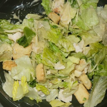 Domino's Pizza - Chicken Caesar salad after mixing in the dressing and goodies - Pizza Near Me - Daytona Beach, Florida Domino's Pizza - Chicken Caesar salad after mixing in the dressing and goodies - Pizza Near Me - Daytona Beach, Florida
