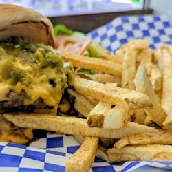 Lavender Cocinita - 2 quarter-pound patties, cheese, red AND green chiles and fries - $9.71