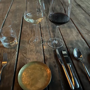 Bacchanalia - Two wines and place setting - New American Near Me - Atlanta, Georgia