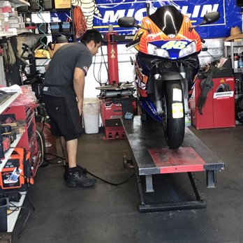 RoadRace City - Moses at work finishing tire install & ensuring Hope is dialed in for her next run. - Motorcycle Repair Near Me - Temple city, California