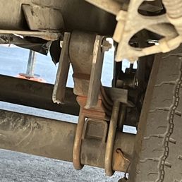 Broken brackets on leaf springs