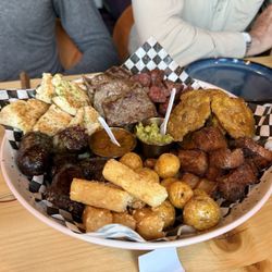 Encanto Restaurant - Park City - "Enchanted Platter - combo platter for four with steak two kinds of sauce, chicken, pork, plantains, potatoes and yucca fries