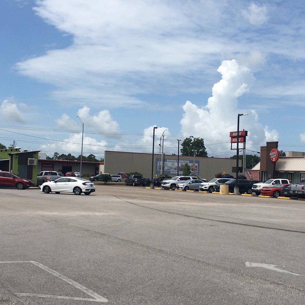 JavaTime - a parking lot full of cars - Bakeries Near Me - Andalusia, Alabama