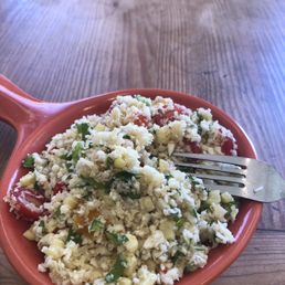 Riced cauliflower with corn peppers and herb Riced cauliflower with corn peppers and herb