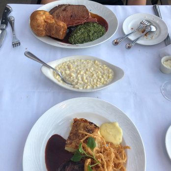 Summit House - Filet mignon with potatoes and crispy onions strings: prime rib with a popover, creamed spinach and creamed corn - Steakhouses Near Me - Fullerton, California