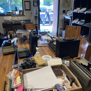 Type Space - The walls are lined with machines. A large center table makes trying out machines easy. - Antiques Near Me - Portland, Oregon