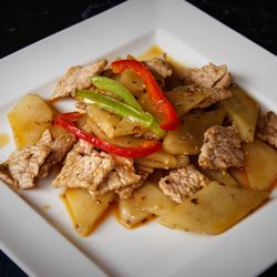 The Grand Yard - Chef;s recommended  sliced pork  cooked with sliced potatoes with house- special cumin seasoning
