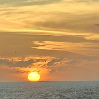 Mindy Sheldon - Tink's Magical Vacations - Sunset off Curaçao. - Travel Agents Near Me