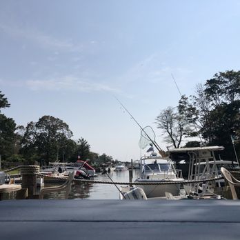 The Station Bar - several boats docked at a dock - Bars Near Me - Hampton Bays, New York