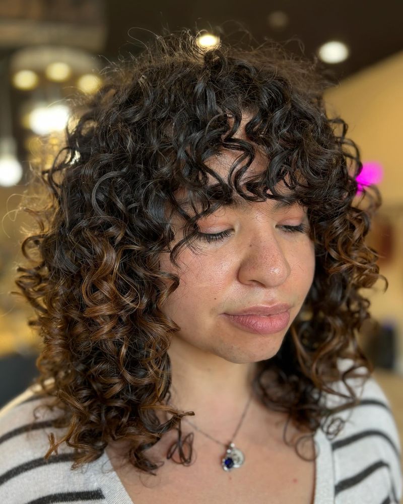 Cosmic Curls Logo