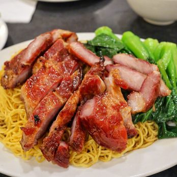 Big Wong - a plate of food with meat and noodles - Chinese Near Me - New York, New York