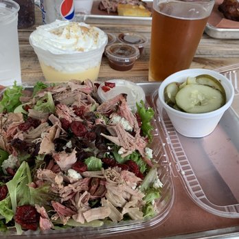 Monk's BBQ - Salad topped with pork bbq, pickles, banana puddling, and of course beer! - Barbeque Near Me - Purcellville, Virginia