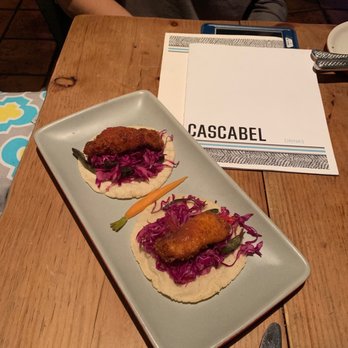 Cascabel - In this photo sits Susan, the menu and Fried Chicken tacos. - Cocktail Bars Near Me - Los Angeles, California