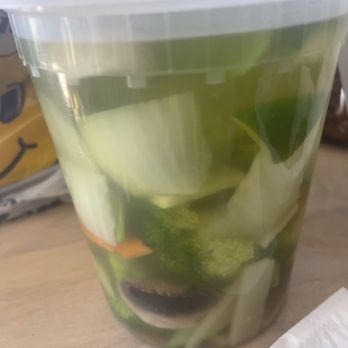 Bei Jing - a plastic cup of pickled cucumbers - Chinese Near Me - Myrtle Beach, South Carolina