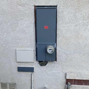 JM Plastering - Stucco repair around electrical panel - Stucco Services Near Me - Riverside, California