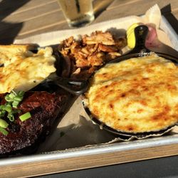 Sweet Auburn BBQ - 1/4 ribs Pulled chicken Mac & cheese Stone Cheese grits Buttery toast Pickles