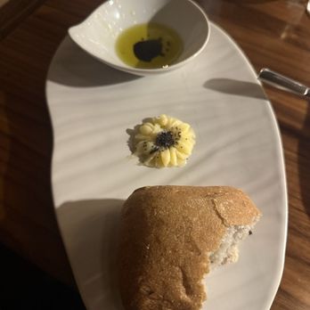 Il Girasole - Bread service. The olive oil is such high quality it's honestly good enough to drink - Italian Near Me - Costa Mesa, California Il Girasole - Bread service. The olive oil is such high quality it's honestly good enough to drink - Italian Near Me - Costa Mesa, California