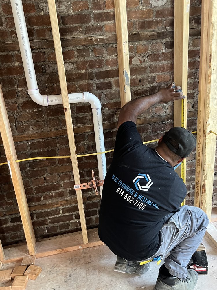 Slide of MJS Plumbing & Heating