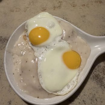 Pine Cone Restaurant - Biscuits and gravy with two sunny side up eggs. - New American Near Me - Johnson Creek, Wisconsin Pine Cone Restaurant - Biscuits and gravy with two sunny side up eggs. - New American Near Me - Johnson Creek, Wisconsin