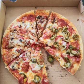 Photo of Razzo's Pizza and Salads - Oakland, CA, United States. Large pizza with pepperoni... half with mushrooms and the other half with jalapenos.