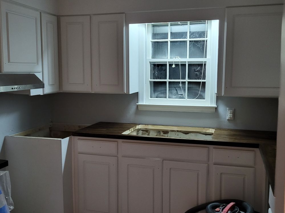 Slide of Bryans Do It All