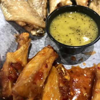 Atomic Wings - Thai chili and plain wings with lemon pepper on the side. - Chicken Wings Near Me - Hyattsville, Maryland Atomic Wings - Thai chili and plain wings with lemon pepper on the side. - Chicken Wings Near Me - Hyattsville, Maryland