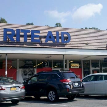 Rite Aid - cars parked in front of a rite aid pharmacy - Drugstores Near Me - Oyster Bay, New York