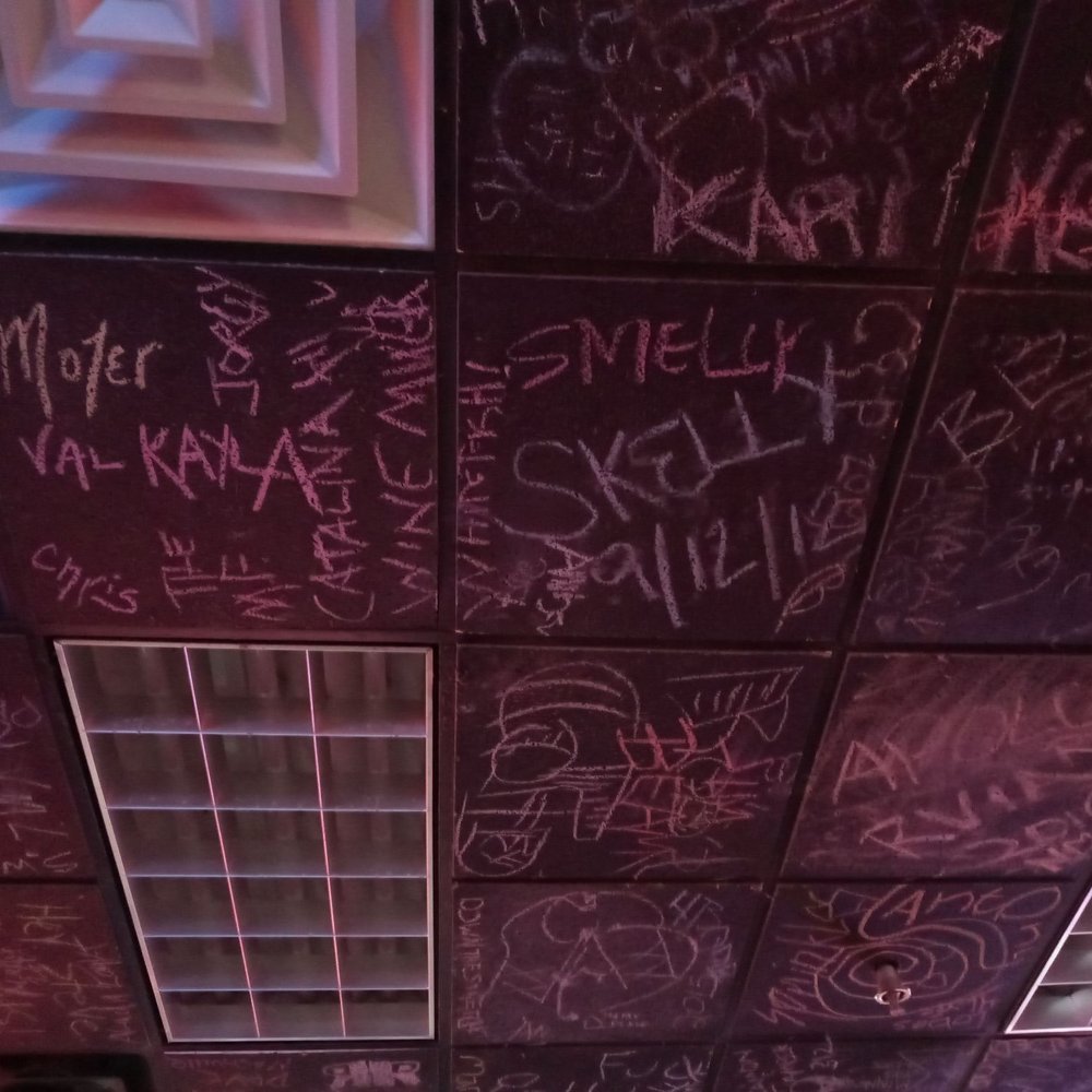 Third Street Dive - Chalk messages of the past can be found all along the walls and even the ceiling. - Dive Bars Near Me - Louisville, Kentucky Third Street Dive - Chalk messages of the past can be found all along the walls and even the ceiling. - Dive Bars Near Me - Louisville, Kentucky