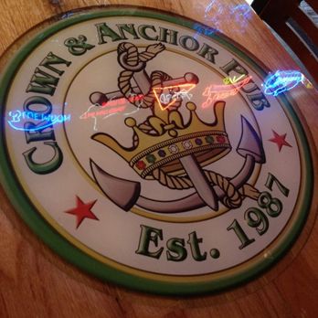 Crown and Anchor Pub - Crown emblem w/ neon sign reflections - Pubs Near Me - Austin, Texas Crown and Anchor Pub - Crown emblem w/ neon sign reflections - Pubs Near Me - Austin, Texas