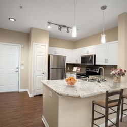 Camden Old Creek Apartments - Kitchen granite countertops stainless appliances