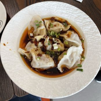 Dumpling Bay - Pork & Cabbage dumplings in chili oil - Dim Sum Near Me - Golden, Colorado