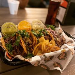 Tacos El Plebe - The sampler. Barbacoa, trompo, puerco, asada, pollo