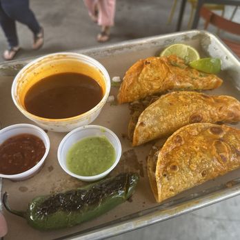 Chilangos Tacos - Quesobirria Tacos with a jalapeño on the side - Tacos Near Me - Nashville, Tennessee