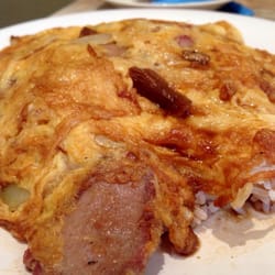 BBQ pork with omelette on steamed rice - generous serving of BBQ pork slices stuffed under a slab of aromatic fried egg.