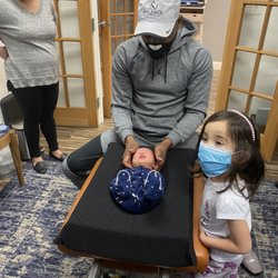 One of our youngest patients! Only a few weeks old! Getting gentle specific chiropractic adjustments.