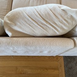 Value City Furniture - A perfect example of how twisted the cover is on the back pillows! All are like this!