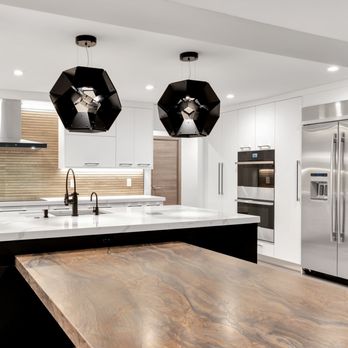 KabCo Kitchens - Striking two-toned kitchen with black accents  and custom  built-in table - Countertop Installation Near Me - Miami, Florida