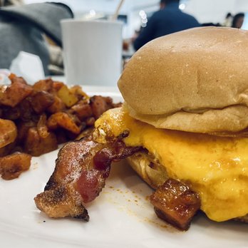 Islander Bar and Grill - Egg sandwich with bacon and potatoes - Bars Near Me - Miami, Florida Islander Bar and Grill - Egg sandwich with bacon and potatoes - Bars Near Me - Miami, Florida