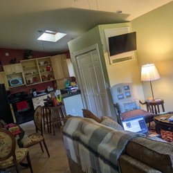Magnolia Court - Living room in the upstairs apartment.