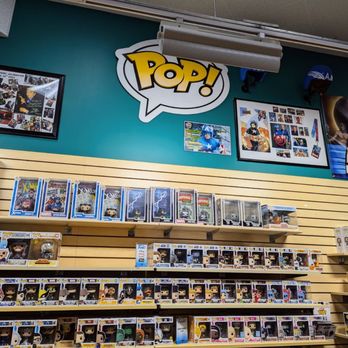 Dragon's Lair Comics & Fantasy - A wall of Funko POP! - Comic Books Near Me - Austin, Texas