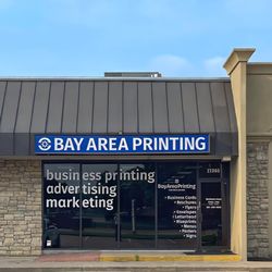 Bay Area Printing front of store at Clear Lake mall with services offered at windows