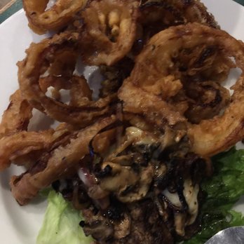 Mary's Bar & Grill - The picture doesn't do the burned onions hidden under the cheese or overcooked rings any justice. - American Near Me - Longview, Washington Mary's Bar & Grill - The picture doesn't do the burned onions hidden under the cheese or overcooked rings any justice. - American Near Me - Longview, Washington